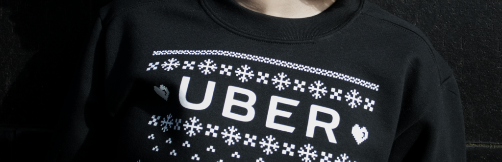 Uber's holiday sweater giveaway - Christmas business gifts for employees 